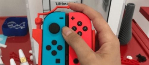 A single-hand Joy-Con adapter for Nintendo Switch | AbleGamers/Twitter