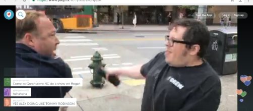 Jones has coffee thrown at him via Periscope screenshot Author: Derek Wood