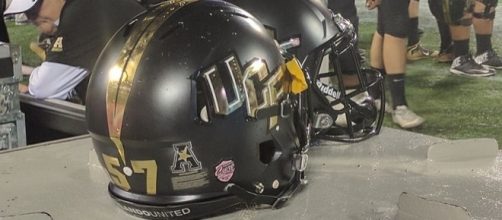 UCF Helmets - Mario Mathis and Caleb Perez's helmets by elisfkc from Orlando, FL, United States via Wikimedia Commons