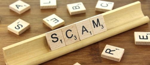 Synonyms of Scam CC BY-SA 3.0 Nick Youngson credits:thebluediamondgallery.com http://www.thebluediamondgallery.com/wooden-tile/s/scam.html