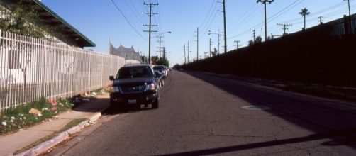 Border fence between Calixaco, California and Mexico. / [Image by Omar B&aacute;rcena via Flickr, CC BY 2.0]