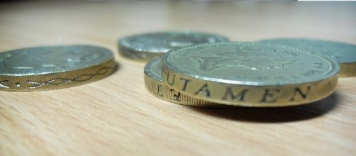 UK economy remains strong despite drop in sterling's value (Pulga Haza via Flikr).