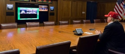 President Trump on teleconference about Hurricane Harvey / [Image by the White House via Flickr, Public Domain]