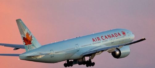 Air Canada passenger arrested after alleged assault of flight attendant / Photo via Brian, Wikimedia Commons