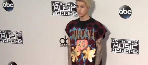 Justin Beiber speaks out following canceled world tour. Image via YouTube/ET