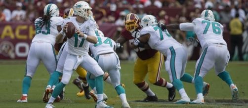 Ryan Tannehill - Dolphins at Redskins 9/13/15 by Keith Allison via Flickr.