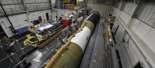 Team installs cable raceway on the Minuteman III boosters (credit - Jonathan Snyder &ndash; wikimediacommons)