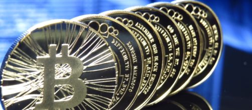 The cost of Bitcoin would double in 2018. [Image via Flickr/Antana]