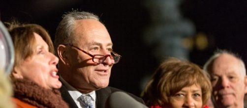 House Minority Speaker Nancy Pelosi (left) Senate Minority Leader Chuck Schumer (center). / [Image by LLorie Shaull via Flickr, CC BY-SA 2.0]