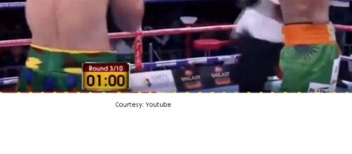 Indian boxer Vijender Singh in action with Chinese boxer Zulpikar.