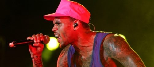 Chris Brown comments on Rihanna's Instagram photo. (Flickr/Eva Rinaldi)