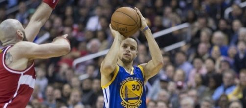 Golden State Warriors guard Stephen Curry shooting the ball. Image Credit: Keith Allison, Flickr -- CC BY-SA 2.0