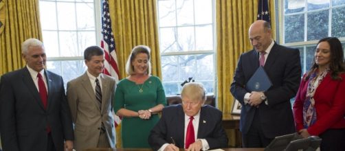 President signing Executive Order 13772