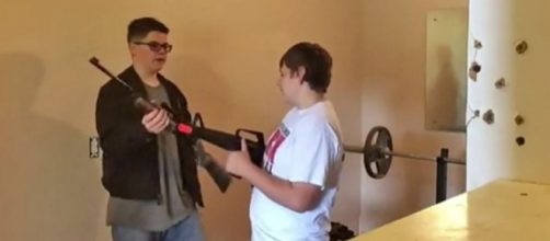 The student who killed one classmate and injured 3 has been identified as Caleb Sharpe, pictured left [Image: YouTube/Christine Weston Chandler]