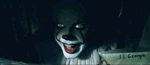 A bunch of cops posted an "It" parody on Facebook, complete with doughnuts, a red balloon and a clown. [Image: YouTube/Warner Bros. Pictures]