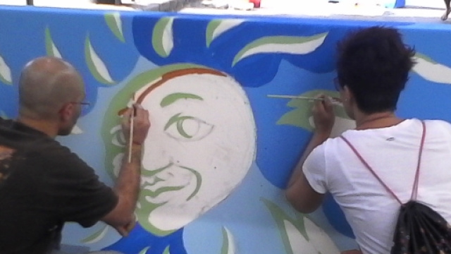 Artisti a lavoro sui New Jersey