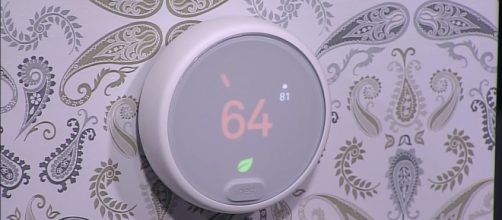 Nest&rsquo;s newest thermostat fits right in any modern home. (via BloombergTechnology/Youtube)