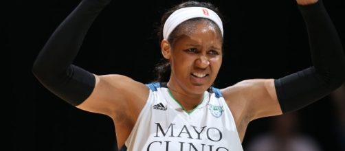 Maya Moore's 20 points helped lead Minnesota to a win at home over Chicago on Friday. [Image via WNBA/YouTube]