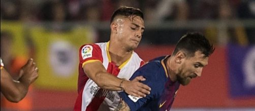 Messi y Maffeo, en un lance del partido de ayer
