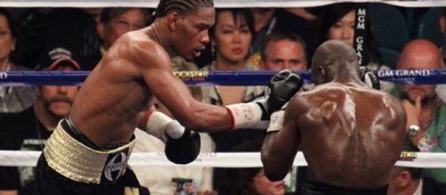 Daniel Jacobs (left) believes he can stop Canelo Alvarez if a fight is set. [Image Credit: Bret Newton/Wikimedia Commons]