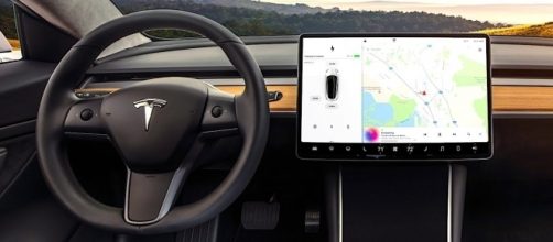 It makes for a spotless dashboard, but the Model 3 display can be a distracting attention hog. / from 'YouTube' screen grab (CARJAM TV)