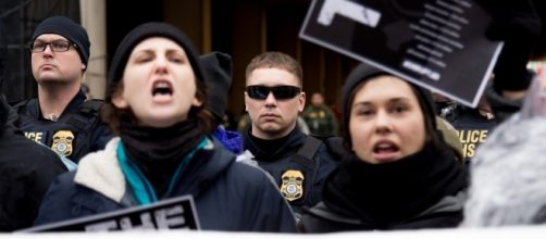 ClimteJ20 protesters on Trump's inauguration day, 2017. / [Image by ClimateJ20 via Flickr, CC BY 2.0]