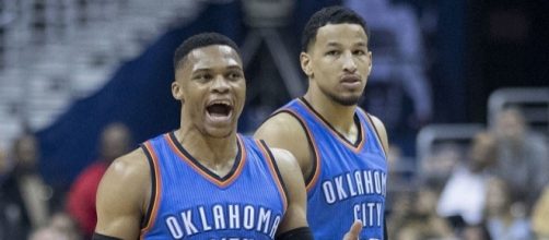 Russell Westbrook signs the extension with OKC. (Photo Credit: Keith Allison/Wikimedia Commons)