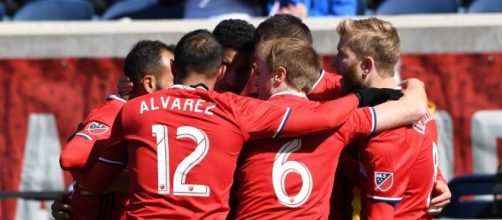 Chicago Fire players celebrate a goal wikimedia.org