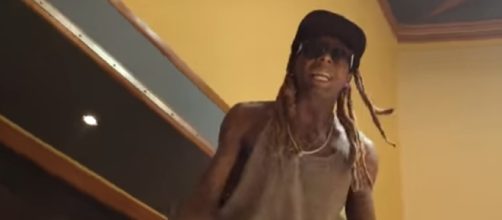 Lil Wayne suffered a seizure on Sunday but is now doing well. Image[WORLDSTARHIPHOP-YouTube]