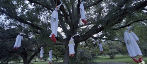 Art activist collective INDECLINE hung clown effigies dressed in Ku Klux Klan costumes in Bryan Park [Image: YouTube/INDECLINE]