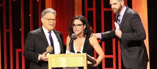 Al Franken presents a Peabody award to Julia Louis-Dreyfus and Timothy Simons from VEEP. Photo: Peabody Awards/Creative Commons