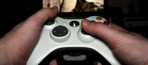 Person playing video games -- Luke Hayfield/Flickr.