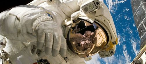 ISS astronaut demonstrates heat shield repair techniques (Image credit - Michael Edward Fossum, Wikimedia Commons)