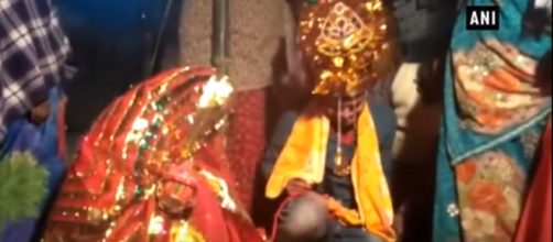 Vinod Kumar is crying while he's being forced to marry an unknown woman. - [The Times of India / YouTube screencap]