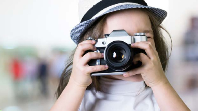 Foto dei figli su Facebook: rischio di forti multe