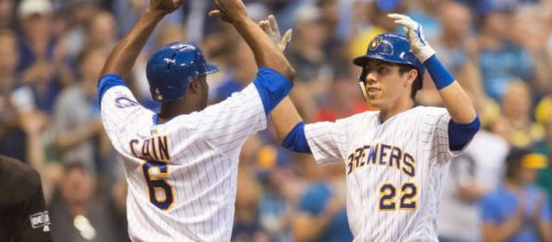 Christian Yelich and Lorenzo Cain have been a hug part of the Brewers winning ways in 2018. [Image via ESPN.com/YouTube]