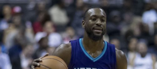 Kemba Walker, averaging 35 points per game, is breaking records to open Charlotte's season. Image Credit- Keith Allison, Wikimedia Commons