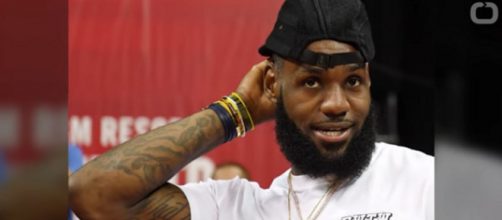 NBA All-Star LeBron James teams with Tim Tebow for CBS competition show Million Dollar Mile. [Image Source: Wochit News - YouTube]