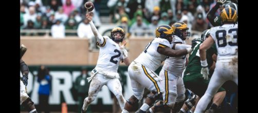 Two Big Ten quarterbacks are reportedly expected to head to the NFL in this year's draft [Image via Michigan Athletics/YouTube screencap]