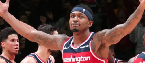 The Wizards' Bradley Beal achieved a 40-point triple-double to help his team win in triple-overtime. [Image via ESPN/YouTube screencap]