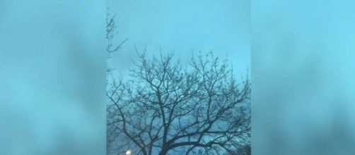 The skies over New York turned a bright neon-blue on Thursday night. [Image New York Daily News/YouTube]