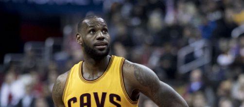 Lebron James looking at scoreboard [image via Wikipedia]