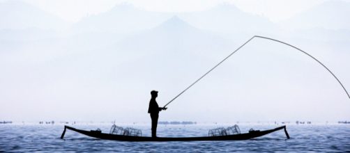 Fishing for signs. (Image via mohammed_hassan/Pixabay)