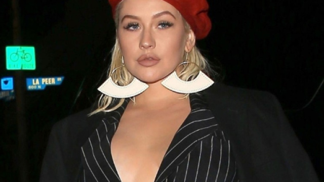 Christina Aguilera Rocked a Pinstripe Jumpsuit and Red Beret for ... - etonline.com