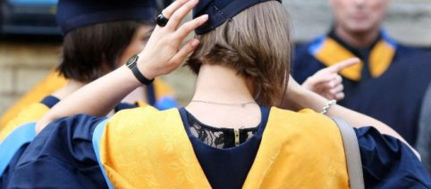 Theresa May is set to announce a review into tuition fees