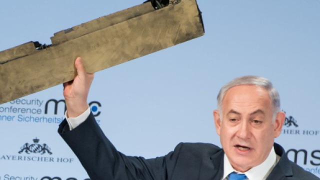 Netanyahu holds up drone piece and warns Iran: 'Do not test Israel' - sky.com