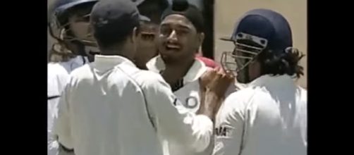 Harbhajan celebrating a wicket with Dhoni. - [Image source: Power/YouTube screencap]