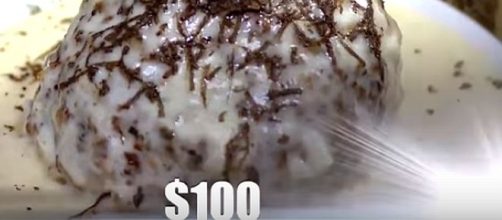 $100 meatball sold on National Meatball Day. - [Image: Inside Edition / YouTube screenshot]