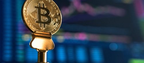 Bitcoin prices drop below $6000. [Photo by Andre Francois on Unsplash]