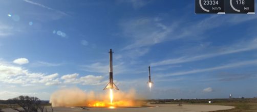 Two side parts from Falcon Heavy landing. - [SpaceX channel / YouTube screencap]